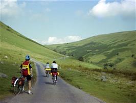 Some cycletourists pass us on the way to Gospel Pass at Parc Bach