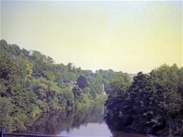 Welsh Bicknor hostel and church in a fabulously secluded location by the River Wye, viewed from the precarious old railway bridge on the way to Stowfield