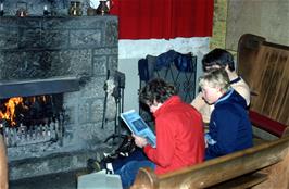 Carl Jeffereys, Matt Tewson and Colin Downie enjoying the fire at Bellever youth hostel