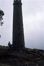 Examining one of the chimneys at the site