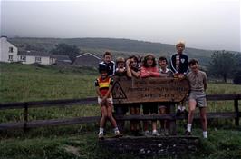 The group at the entrance to Capel-y-Ffin youth hostel, showing the hostel and the hill beyond that we climbed last night.  Richard, Glenn, Kevin, Mark, Nigel, Jackie, Frances, Matthew and John