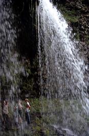 Jackie, John, Mark, Frances and Kevin experiencing the Sgwd yr Eira waterfall