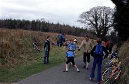 New member Andrew Giles watches the fun and games while Kevin's puncture is repaired near Wilsworthy Farm, Kenn