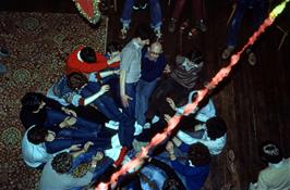 Fun and games in the main hall at Maypool, viewed from the balcony