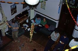 Iris Buckler, Jean Luxton, Don Hassall and others relax in the main hall at Maypool