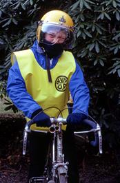 Matthew Tewson on Michael's bike at Crowcombe hostel, showing off his safety clothing