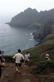 Frances leads us down to the cove with our packed lunches as the mist begins to lift.  Maceley Cove is the second inlet, just around from Elender Cove