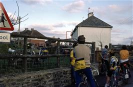 Dave Eyre, Andrew W and Glenn P watch the fun from outside the park at Broadhempston