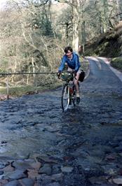 John rides the ford again for the cameras, taking a more central line, just to prove he can do it