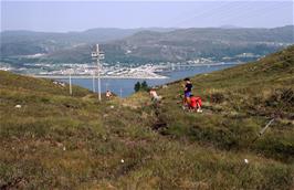 The descent gets steeper as Ullapool comes into view on the other side of Loch Broom