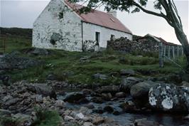 Achininver youth hostel, with the outside toilet hut just visible behind the wall