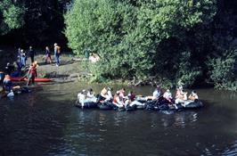 Raft Race action on the River Dart, as seen from Staverton Bridge