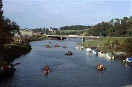 Rafts approach the finish at Totnes, viewed from Totnes Bridge