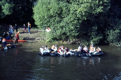 Raft Race action on the River Dart, as seen from Staverton Bridge