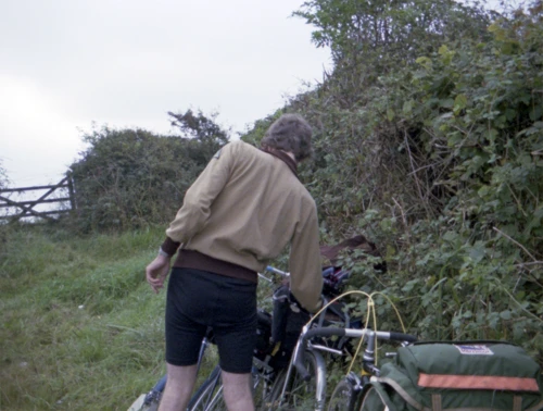 Michael retrieving something from his saddlebag