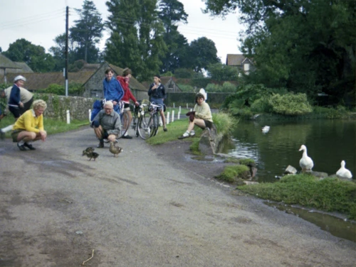 East Quantoxhead. Jean and Frank enjoy the ducks while Liz ponders.